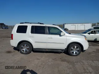 2012 Honda Pilot Touring with VIN 5FNYF4H98CB057659, listed as a IAAI auction lot 41927990 with 140,000 mi miles. Bid and sale history available at carsss.com. Image 13.