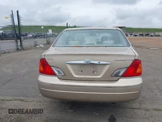 2001 Toyota Avalon XL w/Bucket Seats with VIN 4T1BF28B91U173868, listed as a IAAI auction lot 41721904 with 325,097 mi miles. Bid and sale history available at carsss.com. Image 16.