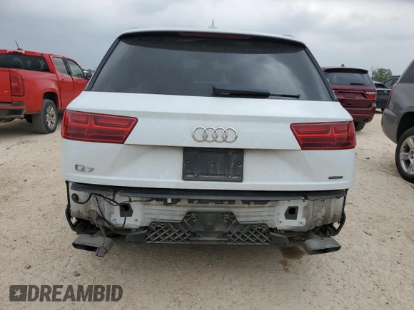2018 Audi Q7 Premium Plus с VIN WA1LHAF73JD014107, выставлен на аукционе Copart как лот 51300515 с пробегом 104 779 миль миль и Списание • Salvage title. История ставок и продаж доступна на DreamBid. Изображение 6.