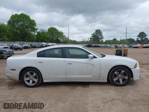 2014 Dodge Charger SE with VIN 2C3CDXBG4EH186881, listed as a IAAI auction lot 41952966 with 206,057 mi miles and . Bid and sale history available at DreamBid. Image 13.