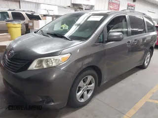 2012 Toyota Sienna LE AAS with VIN 5TDKK3DC0CS177643, listed as a IAAI auction lot 41845652 with 164,771 mi miles. Bid and sale history available at carsss.com. Image 2.
