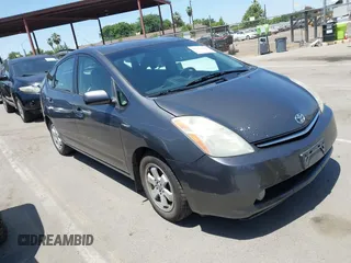 2007 Toyota Prius z VIN JTDKB20U773247820, wystawiony jako IAAI lot #42373905 z przebiegiem 291 590 mil mil oraz . Historia ofert i sprzedaży dostępna na DreamBid. Obrazek 1.