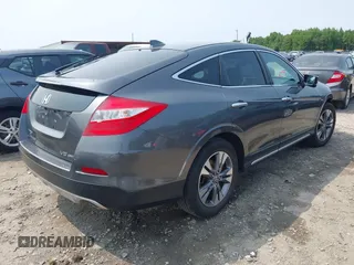 2014 Honda Crosstour EX-L z VIN 5J6TF2H59EL000957, wystawiony jako IAAI lot #42383656 z przebiegiem 116 317 mil mil oraz . Historia ofert i sprzedaży dostępna na DreamBid. Obrazek 4.