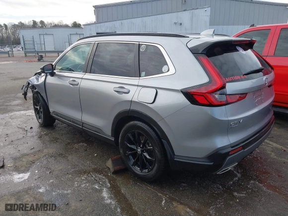 2023 Honda CR-V Hybrid Sport with VIN 2HKRS5H54PH706805, listed as a IAAI auction lot 41599563 with 90,581 mi miles. Bid and sale history available at carsss.com. Image 3.
