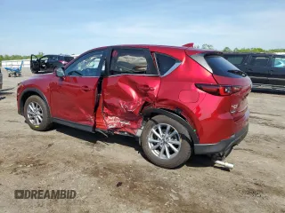2023 Mazda CX-5 S Select with VIN JM3KFBBM2P0242664, listed as a Copart auction lot 55022895 with 14,129 mi miles and Salvage Title. Bid and sale history available at DreamBid. Image 2.
