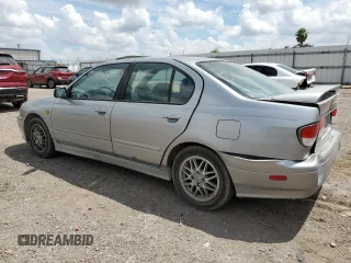 1999 Infiniti G20 z VIN JNKCP11A8XT015021, wystawiony jako Copart lot #67966844 z przebiegiem 268 922 mil mil oraz Szkody całkowita. Historia ofert i sprzedaży dostępna na DreamBid. Obrazek 2.