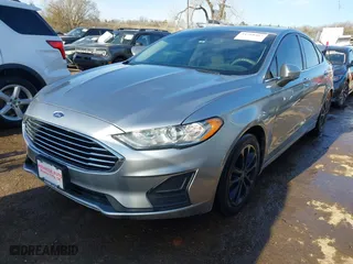 2020 Ford Fusion Hybrid SE with VIN 3FA6P0LU3LR176846, listed as a IAAI auction lot 41760467 with 154,422 mi miles. Bid and sale history available at carsss.com. Image 17.
