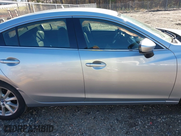 2016 Mazda 6 i Sport with VIN JM1GJ1U50G1412026, listed as a IAAI auction lot 41820838 with 130,262 mi miles and . Bid and sale history available at DreamBid. Image 13.