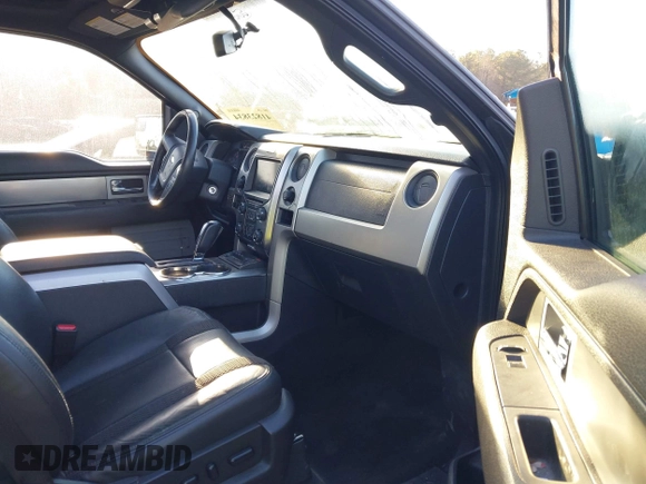 2014 Ford F-150 SVT Raptor with VIN 1FTFW1R60EFC90847, listed as a IAAI auction lot 41823834 with 169,549 mi miles and . Bid and sale history available at carsss.com. Image 5.