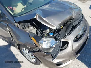 2014 Hyundai Accent GLS with VIN KMHCT4AE6EU639694, listed as a IAAI auction lot 41674605 with 101,549 mi miles and . Bid and sale history available at carsss.com. Image 12.