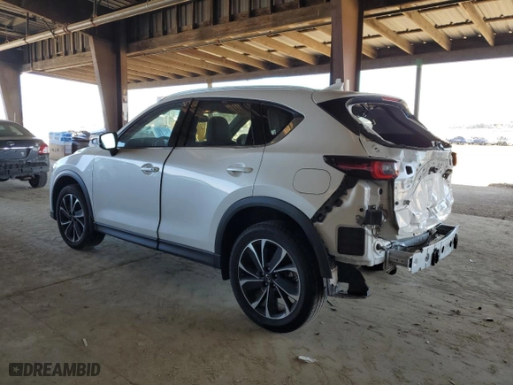 2022 Mazda CX-5 2.5 S Premium Plus Package with VIN JM3KFBEM0N1602467, listed as a Copart auction lot 47271025 with 35,766 mi miles and Salvage Title. Bid and sale history available at carsss.com. Image 2.