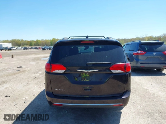 2017 Chrysler Pacifica Touring L with VIN 2C4RC1BG0HR747551, listed as a IAAI auction lot 42139664 with 120,057 mi miles and . Bid and sale history available at DreamBid. Image 15.