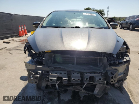 2016 Ford Focus SE with VIN 1FADP3F20GL250053, listed as a Copart auction lot 57134955 with 120,261 mi miles and Salvage title. Bid and sale history available at DreamBid. Image 5.