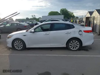 2016 Kia Optima EX with VIN 5XXGU4L38GG008436, listed as a IAAI auction lot 42094498 with 134,781 mi miles. Bid and sale history available at carsss.com. Image 14.