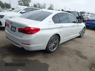 2018 BMW 5 Series 530e with VIN WBAJA9C5XJB033667, listed as a IAAI auction lot 42107936 with 55,753 mi miles and . Bid and sale history available at DreamBid. Image 4.