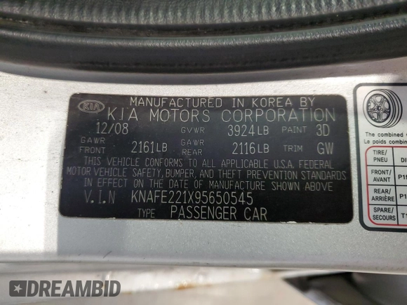 2009 Kia Spectra EX with VIN KNAFE221X95650545, listed as a Copart auction lot 74496974 with 203,752 mi miles and Non Repairable. Bid and sale history available at carsss.com. Image 12.