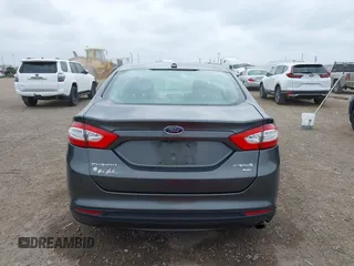 2016 Ford Fusion SE Hybrid with VIN 3FA6P0LU5GR235241, listed as a IAAI auction lot 41697504 with 165,510 mi miles. Bid and sale history available at carsss.com. Image 16.