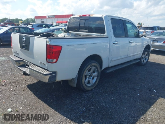 2004 Nissan Titan LE with VIN 1N6AA07A04N561241, listed as a IAAI auction lot 42180597 with 166,529 mi miles and . Bid and sale history available at DreamBid. Image 4.