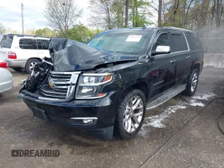 2015 Chevrolet Suburban LTZ with VIN 1GNSKKKC5FR255373, listed as a IAAI auction lot 42012528 with 219,030 mi miles and . Bid and sale history available at DreamBid. Image 17.