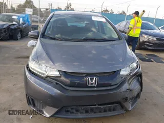 2015 Honda Fit LX with VIN 3HGGK5H5XFM719477, listed as a IAAI auction lot 41671194 with 145,876 mi miles. Bid and sale history available at carsss.com. Image 12.