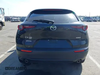 2021 Mazda CX-30 Select with VIN 3MVDMBBL5MM312972, listed as a IAAI auction lot 41792275 with 11,683 mi miles and . Bid and sale history available at carsss.com. Image 15.