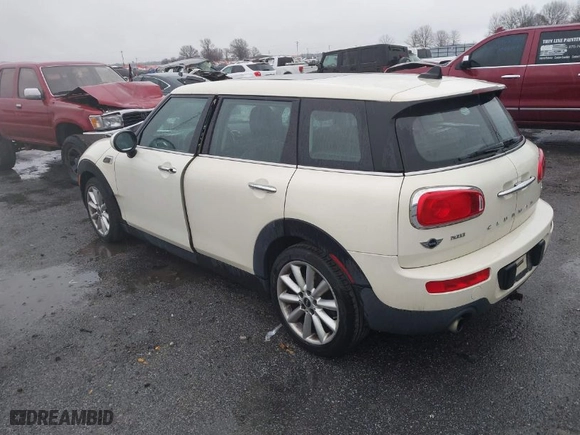 2016 MINI Cooper Clubman with VIN WMWLN5C59G2E30093, listed as a IAAI auction lot 41535638 with 89,224 mi miles. Bid and sale history available at carsss.com. Image 3.