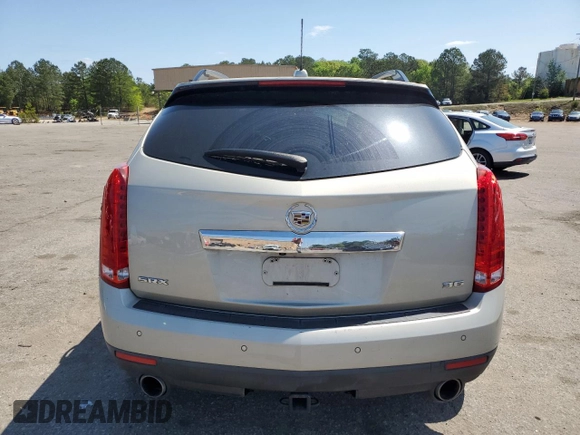 2015 Cadillac SRX Performance Collection z VIN 3GYFNCE31FS638057, wystawiony jako Copart lot #52454065 z przebiegiem 198 417 mil mil oraz Czysty tytuł • Clean title. Historia ofert i sprzedaży dostępna na DreamBid. Obrazek 6.