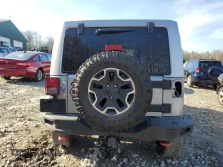 2013 Jeep Wrangler Unlimited Rubicon 10th Anniversary z VIN 1C4HJWFG3DL692993, wystawiony jako Copart lot #78599224 z przebiegiem 135 942 mil mil oraz Szkoda całkowita • Salvage title. Historia ofert i sprzedaży dostępna na DreamBid. Obrazek 6.