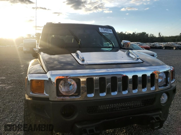 2006 Hummer H3 with VIN 5GTDN136168305793, listed as a Copart auction lot 77040914 with 149,400 mi miles and Salvage Title. Bid and sale history available at carsss.com. Image 5.