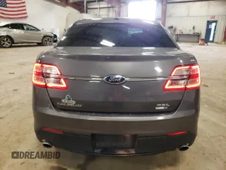 2013 Ford Taurus SEL z VIN 1FAHP2H83DG223446, wystawiony jako Copart lot #53783815 z przebiegiem 122 867 mil mil oraz Czysty tytuł • Clean title. Historia ofert i sprzedaży dostępna na DreamBid. Obrazek 6.