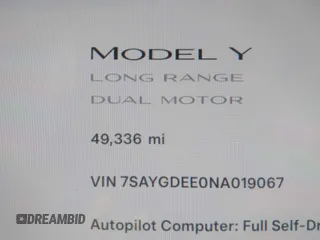 2022 Tesla Model Y Long Range with VIN 7SAYGDEE0NA019067, listed as a IAAI auction lot 41645198 with 49,336 mi miles and . Bid and sale history available at DreamBid. Image 16.