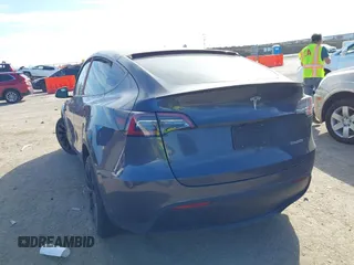 2022 Tesla Model Y Performance z VIN 7SAYGDEF8NF494753, wystawiony jako IAAI lot #41692464 z przebiegiem 14 616 mil mil oraz . Historia ofert i sprzedaży dostępna na DreamBid. Obrazek 3.