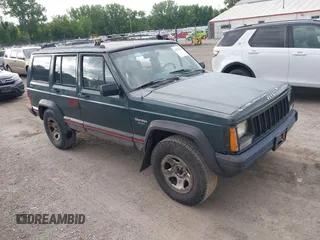 1993 Jeep Cherokee Sport z VIN 1J4FJ68S2PL622716, wystawiony jako IAAI lot #42570145 z przebiegiem 183 159 mil mil oraz . Historia ofert i sprzedaży dostępna na DreamBid. Obrazek 1.