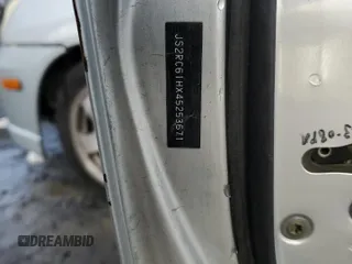 2004 Suzuki Aerio SX z VIN JS2RC61HX45253671, wystawiony jako Copart lot #85587754 z przebiegiem 171 436 mil mil oraz Szkoda całkowita • Salvage title. Historia ofert i sprzedaży dostępna na DreamBid. Obrazek 12.