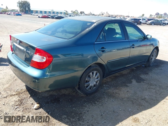 2004 Toyota Camry LE with VIN 4T1BE32K64U340905, listed as a IAAI auction lot 41992386 with 112,292 mi miles. Bid and sale history available at carsss.com. Image 4.