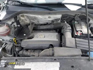 2017 Volkswagen Tiguan S with VIN WVGBV7AX3HK020883, listed as a IAAI auction lot 41782168 with 87,650 mi miles and . Bid and sale history available at DreamBid. Image 10.