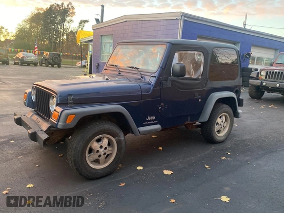 2003 Jeep Wrangler SE with VIN 1J4FA29143P371506, listed as a Copart auction lot 80153184 with 101,513 mi miles and Clean title. Bid and sale history available at DreamBid. Image 2.