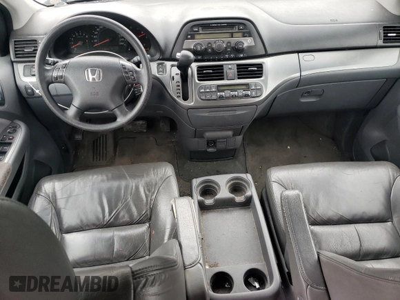 2007 Honda Odyssey EX with VIN 5FNRL38427B513477, listed as a Copart auction lot 62457695 with 216,977 mi miles and Salvage title. Bid and sale history available at DreamBid. Image 8.