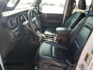 2021 Jeep Wrangler Unlimited Sahara z VIN 1C4JJXP63MW720948, wystawiony jako Copart lot #57115825 z przebiegiem 33 391 mil mil oraz Szkoda całkowita • Salvage title. Historia ofert i sprzedaży dostępna na DreamBid. Obrazek 7.
