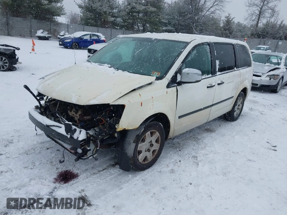 2009 Dodge Grand Caravan with VIN 2D8HN11E19R703857, listed as a IAAI auction lot 41195565 with 199,776 mi miles and . Bid and sale history available at DreamBid. Image 18.