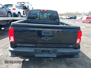 2018 Chevrolet Silverado 1500 with VIN 1GCVKSEC3JZ125571, listed as a IAAI auction lot 41982881 with 58,410 mi miles and . Bid and sale history available at DreamBid. Image 16.