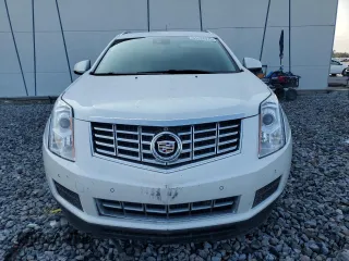 2014 Cadillac SRX Luxury Collection z VIN 3GYFNBE39ES567196, wystawiony jako Copart lot #55326075 z przebiegiem 98 942 mil mil oraz Szkody całkowita. Historia ofert i sprzedaży dostępna na DreamBid. Obrazek 5.
