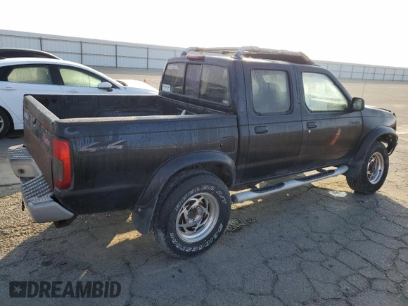 2000 Nissan Frontier XE z VIN 1N6ED27Y2YC369211, wystawiony jako Copart lot #80594884 z przebiegiem 225 194 mil mil oraz Czysty tytuł • Clean title. Historia ofert i sprzedaży dostępna na DreamBid. Obrazek 3.