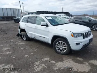 2021 Jeep Grand Cherokee Laredo X with VIN 1C4RJEAG3MC712147, listed as a IAAI auction lot 41807677 with 79,455 mi miles. Bid and sale history available at carsss.com. Image 1.