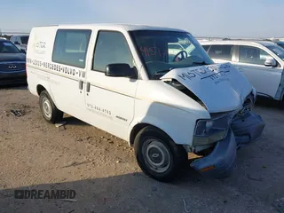 1999 Chevrolet Astro Cargo with VIN 1GCDM19W4XB141901, listed as a IAAI auction lot 41572036 with Not Provided miles. Bid and sale history available at carsss.com. Image 1.
