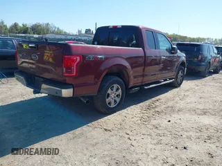 2015 Ford F-150 XLT with VIN 1FTEX1EP1FFC04227, listed as a IAAI auction lot 42048985 with 96,179 mi miles. Bid and sale history available at carsss.com. Image 4.