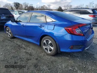 2019 Honda Civic Sedan LX with VIN 19XFC2F61KE038744, listed as a Copart auction lot 85879744 with 0 mi miles and Salvage Title. Bid and sale history available at carsss.com. Image 2.