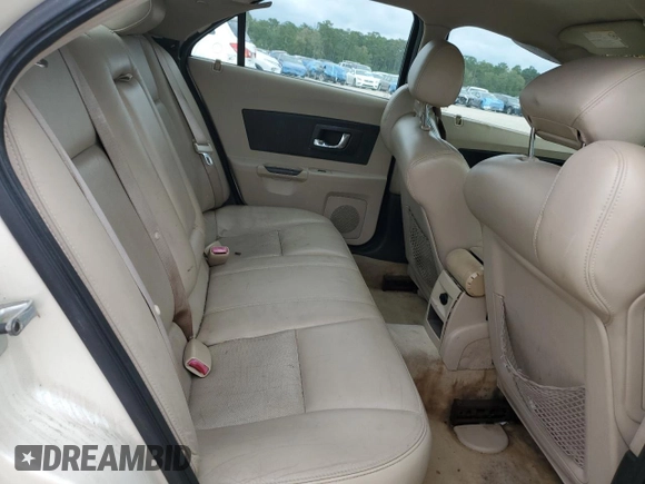 2004 Cadillac CTS with VIN 1G6DM577X40164953, listed as a Copart auction lot 70134254 with 229,874 mi miles and Salvage Title. Bid and sale history available at carsss.com. Image 10.