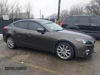 2014 Mazda 3 S Touring with VIN JM1BM1V31E1111499, listed as a IAAI auction lot 41476457 with 109,337 mi miles and . Bid and sale history available at DreamBid. Image 13.