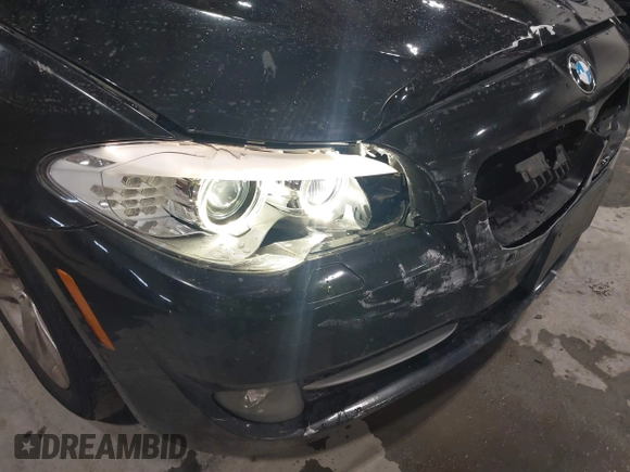 2013 BMW 5 Series 528i xDrive with VIN WBAXH5C57DD109045, listed as a IAAI auction lot 41525875 with 121,549 mi miles. Bid and sale history available at carsss.com. Image 12.